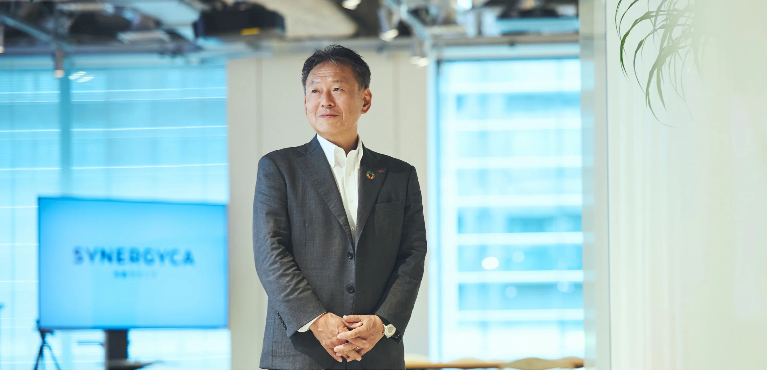共創スペースに立つ山口登造氏